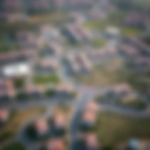 Aerial view of Muhaisnah showcasing its residential areas and parks